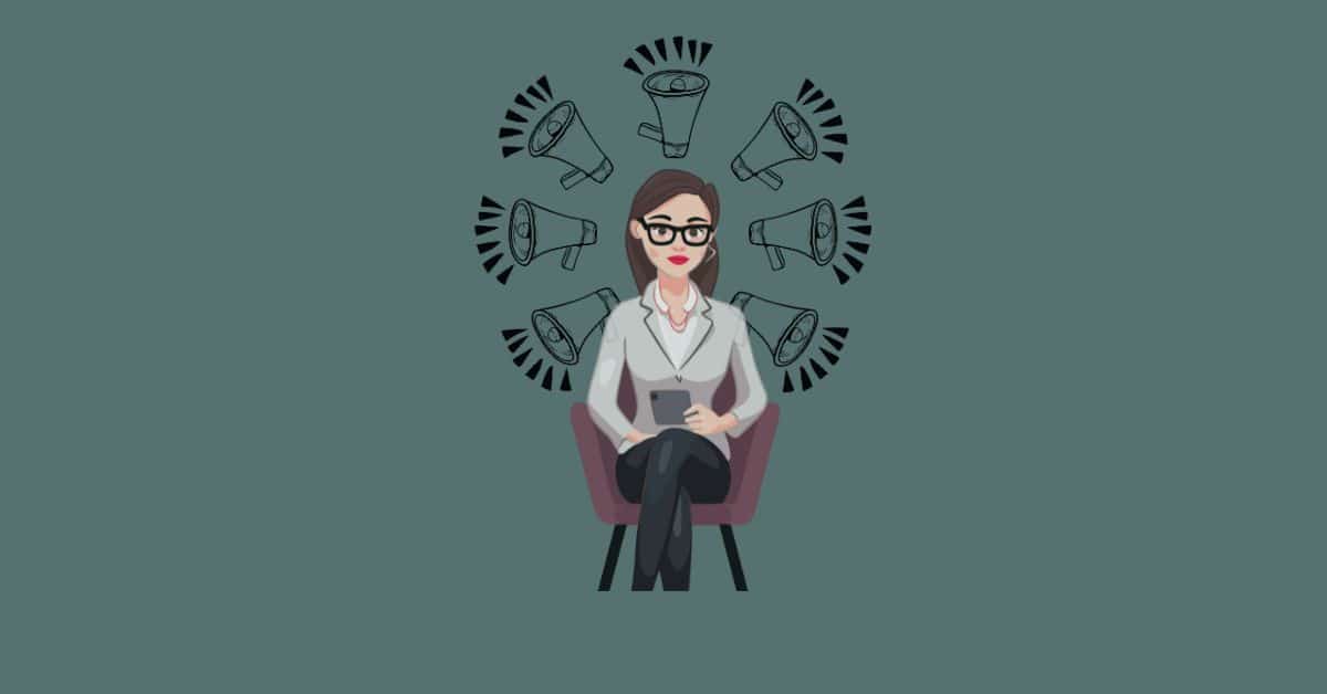 Business Woman seated. Megaphones surround her, showing the importance of speaking business-english well. Spoken Business English Course.